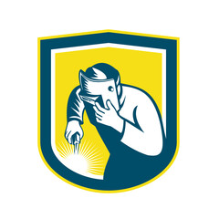 Welder Holding Welding Torch Mask Shield Retro