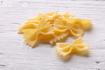 durum wheat pasta on white wood