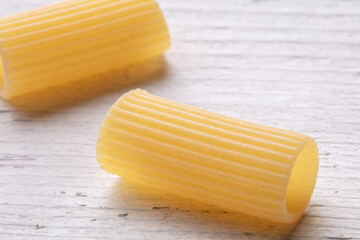 durum wheat pasta on white wood