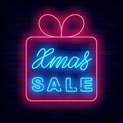 Xmas sale neon signboard in present frame. Merry Christmas special offer. Light lettering. Vector stock illustration