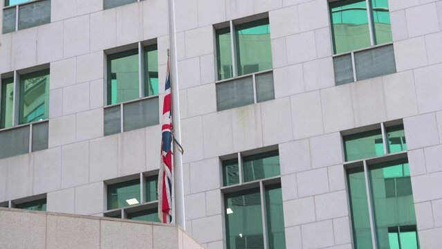 Britain national flag flies half-mast at the British Consulate General in Hong Kong to mark the death of the longest-serving monarch Queen Elizabeth II.