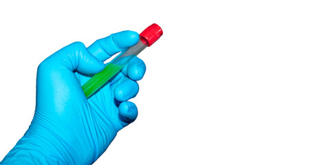Hand with latex surgical glove holds sealed test tube with green liquid on white background, laboratory safety concept.