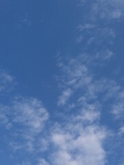 White clouds almost cover the blue sky or bright blue sky and are full of white clouds during the day