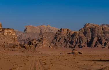 Fototapeta na wymiar Wadi Rum desert and rock formations on a sunny day, Jordan landscapes