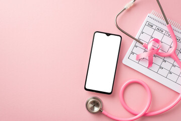 Top view photo of pink ribbon symbol of breast cancer awareness smartphone stethoscope and calendar...