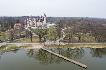 Drone view of Moszna Castle from the 18th century, Poland