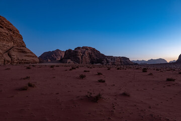 Fototapeta na wymiar Desert landscape at golden hour at sunset in the Wadi Rum desert, Jordan