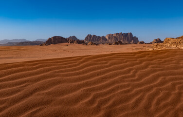 Dunes and patterns in the sand in the Wadi Rum desert, sunny day, Jordan
