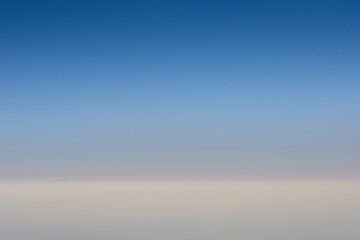 Obraz premium blue sky and soft white clouds during a flight on vacation