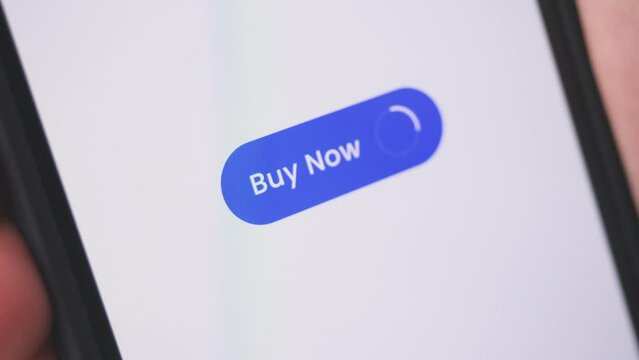 Young lady pressing buy now button on smartphone. Online shopping concept.