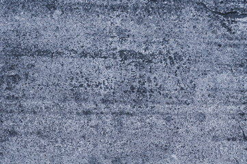 Gray concrete wall, uneven grungy vintage background close-up, grunge texture.