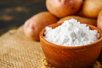 potato starch on a dark rustic background