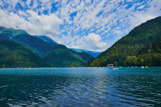Lake Ritsa is a lake in the Caucasus Mountains in Abkhazia region. Summer bright landscape.