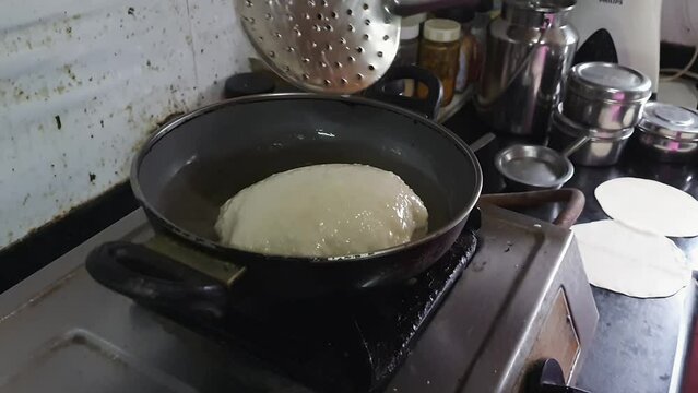 Preparation of Indian popular food Poori at home