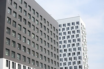 New building facade in housing complex "Green Park. PIK", Moscow city, Russia. Modern style in architecture. Contemporary house in dormitory area. Urban landmark, home. Black facade of building