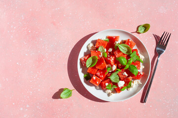 watermelon salad with feta cheese and basil. healthy summer dessert
