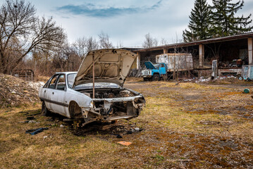 Wrecks of rusty abandoned car