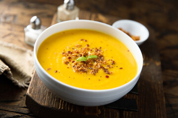 Traditional pumpkin soup with crunchy onion