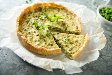 Homemade green pea quiche with cheese - obrazy, fototapety, plakaty