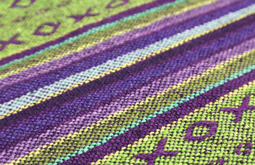 Closeup Pattern and Texture of Purple and Lime Green Thai Northern Region's Traditional Textile