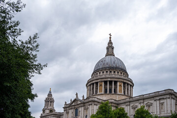 Fototapeta na wymiar View of Saint Paul Cathedral's dome on a cloudy summer afternoon, London, England