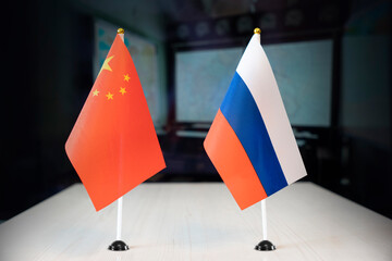 flags of russia and china international negotiations. conclusion of contracts between countries....