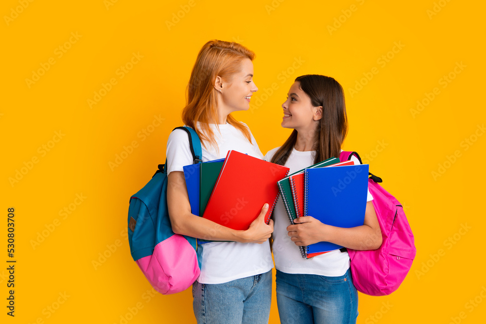 Poster mother and daughter schoolgirls with school bag ready to learn. back to school. mom and child on iso