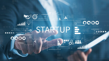 Concept of startup business to be successful, Businessman touch virtual screen, business icons and network connections on global modern interface.