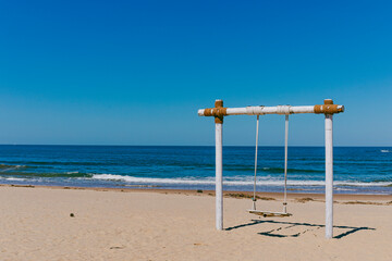Obraz na płótnie Canvas beach with swing