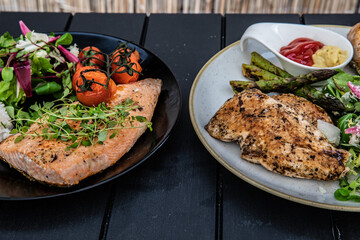 Grilled salmon and grilled chicken fillet