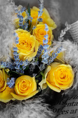 Still life of yellow roses and lavender bouquet flower on black and white, color card