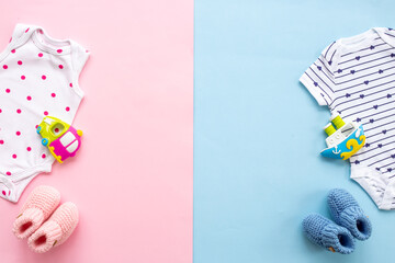 Baby shower concept. Infant cotton clothes with kids accessories, flat lay