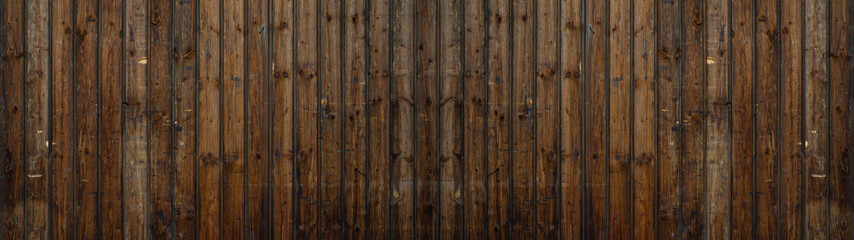 Old brown rustic dark woodenboards wall texture - wood background panorama banner long textured...