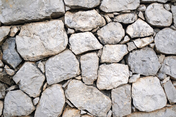 Old castle stone wall texture background close up