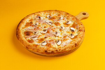 Homemade pizza with mushrooms and cheese.