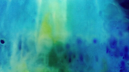 Abstract colorful watercolor background. Spots of green paint with blue, wet technique.