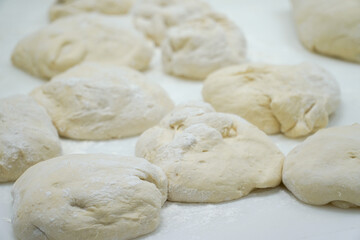 Fototapeta na wymiar master making dough for bread