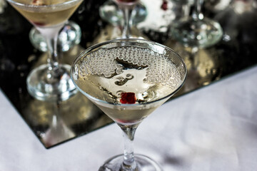 Glass of champagne cocktail with bubble