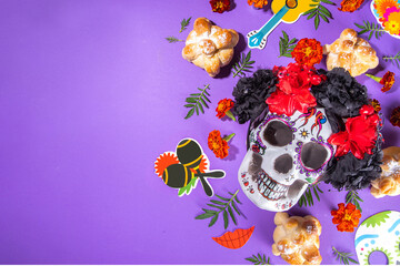  Spanish Mexican traditional holiday, autumn festival Day of the Dead (dia de los muertos) background. With traditional Pan de Muerto bread, decorations and marigold and cempasuchil flowers