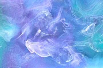 Blue multicolored smoke abstract background, acrylic paint underwater explosion
