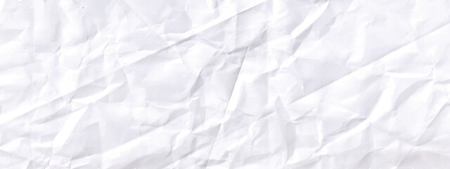 Paper crumple with the texture of the surface of the old. The background is white with kinks and cracks in a retro style. Paper texture Crumpled White. Top view.