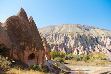 Obraz premium Awesome view of rock formations in Pasabag valley in Cappadocia, Turkey. Fabulous landscape of Goreme Historical National Park. Cappadocia is a popular tourist destination of Turkey.