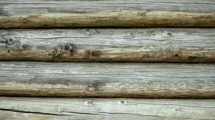 texture background in the form of horizontal round logs,