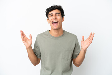 Fototapeta premium Young Argentinian man isolated on white background smiling a lot