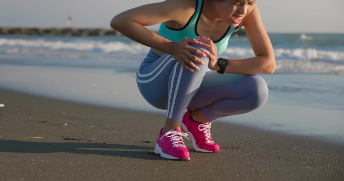 female runner has knee injury