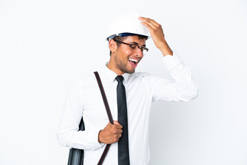 Architect brazilian man with helmet and holding blueprints has realized something and intending the solution