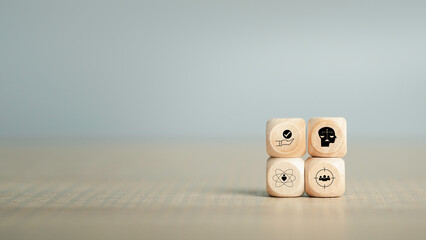 Ethics inside human mind, Business ethics concept. Ethics inside a head symbols in wooden cubes...