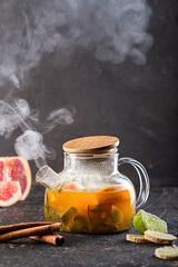 fruit tea in a teapot with steam