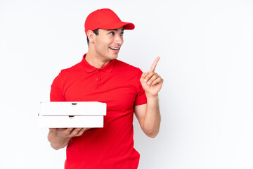 Pizza delivery caucasian man with work uniform picking up pizza boxes isolated on white background...
