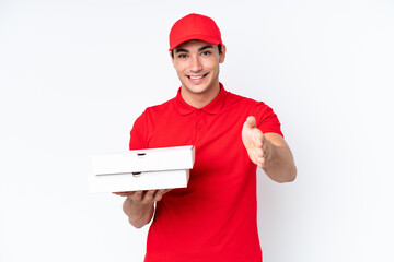 Pizza delivery caucasian man with work uniform picking up pizza boxes isolated on white background shaking hands for closing a good deal